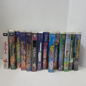 Huge Lot Of 14 VHS Disney + Warner Bros Clamshell Movies Animated Live Action